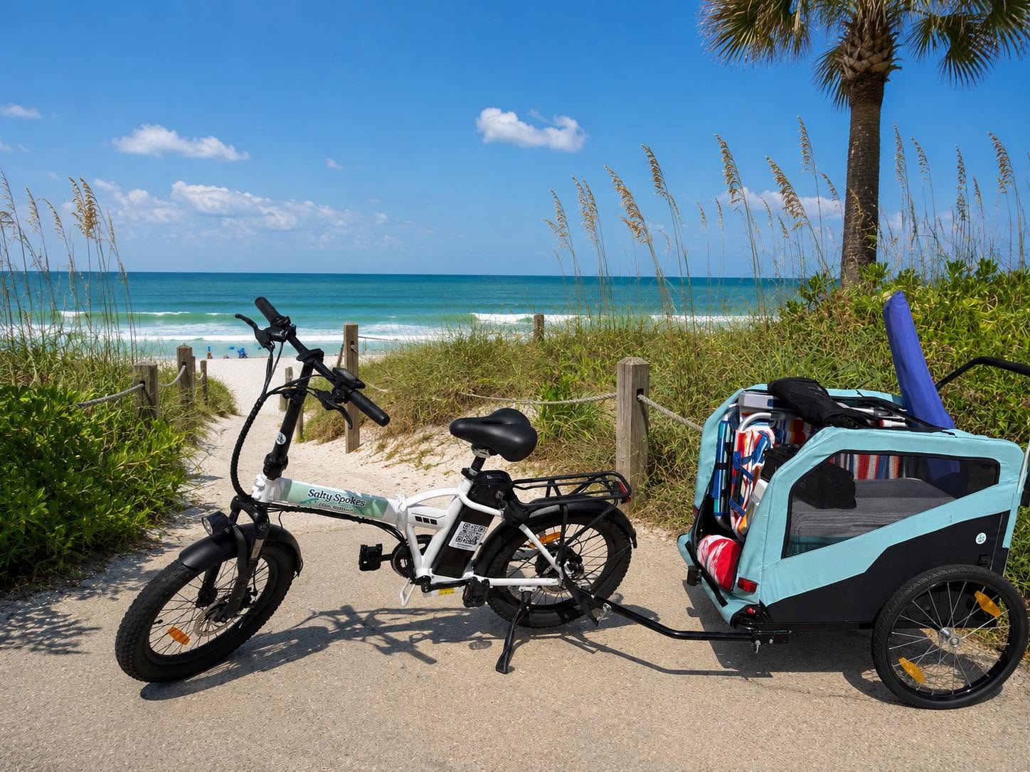 Salty Spokes e-bike and trailer at a beach access